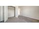 Bright bedroom with carpeting, closet, and neutral paint, ready for personal touches at 12732 Lateral Root Dr, Sarasota, FL 34238