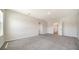 Bedroom with neutral carpeting, two entry doors, and ample space at 12732 Lateral Root Dr, Sarasota, FL 34238