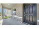 Close up on the stone detail accents, front door and covered porch of this charming home at 12732 Lateral Root Dr, Sarasota, FL 34238