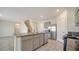 Kitchen boasts granite countertops, stainless steel appliances, and a convenient center island at 12732 Lateral Root Dr, Sarasota, FL 34238