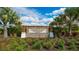 Promenade Estates at Wiregrass Ranch community entrance sign surrounded by landscaping at 12732 Lateral Root Dr, Sarasota, FL 34238