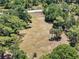 Spacious cleared lot with a few trees on a large parcel, great for building your dream home at 13719 Seminole Trl, Wimauma, FL 33598