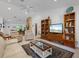 Comfortable living room with neutral walls, stylish furnishings, and a decorative area rug at 13719 Seminole Trl, Wimauma, FL 33598