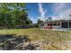Large backyard with a patio area for outdoor enjoyment at 138 Pearl Ave, Sarasota, FL 34243