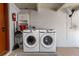 Laundry area featuring a washer and dryer, plus ample space at 138 Pearl Ave, Sarasota, FL 34243