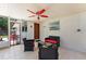Covered patio with seating area, ideal for relaxing outdoors at 138 Pearl Ave, Sarasota, FL 34243