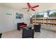 Enclosed patio featuring comfortable seating and ceiling fan at 138 Pearl Ave, Sarasota, FL 34243