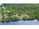 Aerial view of park land with nature trail and lakeside access on the Myakka River at 156 Myakka Rd, Venice, FL 34293