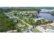 Aerial view of a charming single-Gathering home nestled in a picturesque neighborhood near the water at 156 Myakka Rd, Venice, FL 34293