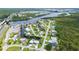Panoramic aerial view of the neighborhood with waterfront homes and tranquil canals at 156 Myakka Rd, Venice, FL 34293