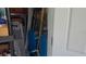 View of two A.O. Smith water heaters inside home's utility area, behind a white door at 156 Myakka Rd, Venice, FL 34293