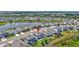 Aerial view of home with lush backyard, patio area, and view of the community at 17330 Harvest Moon Way, Bradenton, FL 34211