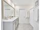 Clean bathroom features double vanity and a shower at 17330 Harvest Moon Way, Bradenton, FL 34211
