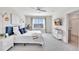 Inviting bedroom featuring carpeted floors, a window, and minimalist décor at 17330 Harvest Moon Way, Bradenton, FL 34211