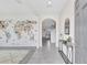 Bright entryway featuring tile floors, stylish console table, and a decorative world map at 17330 Harvest Moon Way, Bradenton, FL 34211