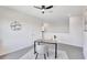 Bright office space with a modern desk, plush rug, and stylish decor creates a productive and inviting atmosphere at 17330 Harvest Moon Way, Bradenton, FL 34211