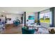 Open concept home design with views from living room, dining area, and kitchen at 18303 Wheathouse Pl, Lakewood Ranch, FL 34211