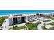 Beautiful beachside condos boast lush landscaping and easy beach access for relaxed coastal living at 1945 Gulf Of Mexico Dr # M2-313, Longboat Key, FL 34228