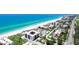Aerial view of beachfront condo with pristine sands and turquoise waters at 1945 Gulf Of Mexico Dr # M2-313, Longboat Key, FL 34228