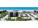 Inviting condo complex near the beach, features manicured lawns and convenient parking for residents at 1945 Gulf Of Mexico Dr # M2-313, Longboat Key, FL 34228
