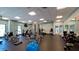 Spacious gym with exercise equipment, weights, mirrors, and rubber flooring at 1945 Gulf Of Mexico Dr # M2-313, Longboat Key, FL 34228