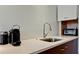 Kitchen countertop featuring stainless steel sink, modern faucet, and a built-in toaster oven at 1945 Gulf Of Mexico Dr # M2-313, Longboat Key, FL 34228