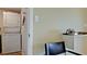 Efficient laundry area with stacked washer and dryer for easy access and space saving at 1945 Gulf Of Mexico Dr # M2-313, Longboat Key, FL 34228