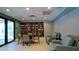 Inviting lounge area featuring a cozy library, comfortable seating, and tranquil atmosphere at 1945 Gulf Of Mexico Dr # M2-313, Longboat Key, FL 34228