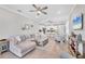 Bright and airy living room featuring neutral decor, recessed lighting, and modern furnishings at 197 Villoresi Blvd, Nokomis, FL 34275