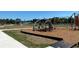A neighborhood playground with various play structures and ample space for recreation at 22275 Belinda Ave, Port Charlotte, FL 33952
