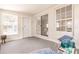 Bright sunroom featuring access to the yard through sliding glass doors at 22275 Belinda Ave, Port Charlotte, FL 33952