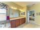 Spacious bathroom with dual sink vanity and large soaking tub at 235 River Enclave Ct, Bradenton, FL 34212