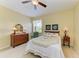 Bedroom with a bed, window view, and dresser at 235 River Enclave Ct, Bradenton, FL 34212