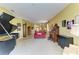 Expansive living area featuring piano, stylish seating, and an open layout at 235 River Enclave Ct, Bradenton, FL 34212