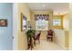 Open landing office area with vintage desk and floral curtains at 235 River Enclave Ct, Bradenton, FL 34212
