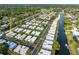 Breathtaking aerial view of neighborhood with intercoastal waterway and ocean access at 2419 Riverbluff Pkwy # V233, Sarasota, FL 34231