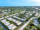 Birds-eye view of neighborhood near intercoastal waterway with quick access to the Gulf of Mexico at 2419 Riverbluff Pkwy # V233, Sarasota, FL 34231