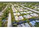 An aerial perspective showing the community's serene setting at 2419 Riverbluff Pkwy # V233, Sarasota, FL 34231