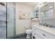 Beautiful bathroom featuring modern fixtures, a glass shower, and vanity at 2419 Riverbluff Pkwy # V233, Sarasota, FL 34231
