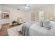 Spacious bedroom with ample natural light, a ceiling fan, and hardwood flooring at 2419 Riverbluff Pkwy # V233, Sarasota, FL 34231