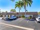 Well-maintained building exterior with manicured landscaping, ample parking, and a welcoming entrance at 2419 Riverbluff Pkwy # V233, Sarasota, FL 34231