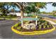Welcoming Strathmore Riverside Villas entrance sign, a lovely 55+ community at 2419 Riverbluff Pkwy # V233, Sarasota, FL 34231