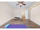 Open space for exercise equipment, laminate wood flooring, and natural light at 2419 Riverbluff Pkwy # V233, Sarasota, FL 34231