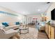 Inviting living room with stylish decor and seamless flow to other living spaces at 2419 Riverbluff Pkwy # V233, Sarasota, FL 34231