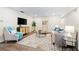Comfortable living room with natural light and stylish decor at 2419 Riverbluff Pkwy # V233, Sarasota, FL 34231