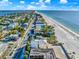 Beautiful overhead view of beach neighborhood with ocean views, blue skies, and scenic surroundings at 2500 Gulf N Dr, Bradenton Beach, FL 34217