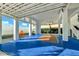 Recreational basketball court area with painted lines and modern fixtures beneath the house at 2500 Gulf N Dr, Bradenton Beach, FL 34217
