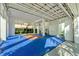 Recreational basketball court area with painted lines and modern fixtures beneath the house at 2500 Gulf N Dr, Bradenton Beach, FL 34217