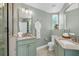 Beautiful bathroom with dual vanities, a glass-enclosed shower, and elegant fixtures at 2500 Gulf N Dr, Bradenton Beach, FL 34217