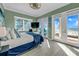 Bright bedroom with access to a balcony and stunning views of the ocean at 2500 Gulf N Dr, Bradenton Beach, FL 34217
